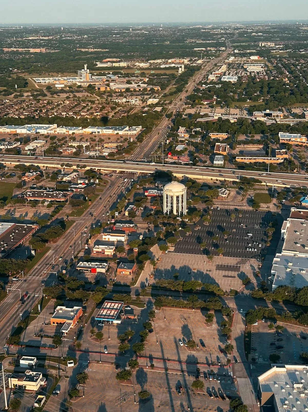 Suburban community aerial with commuter roads